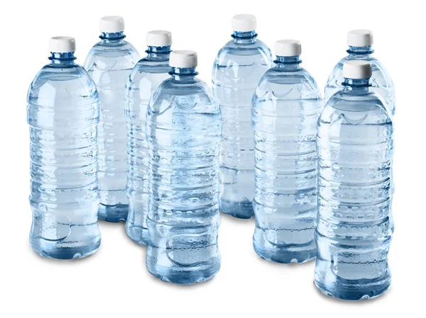 Osiem butelek wody - na białym tle — Zdjęcie stockowe