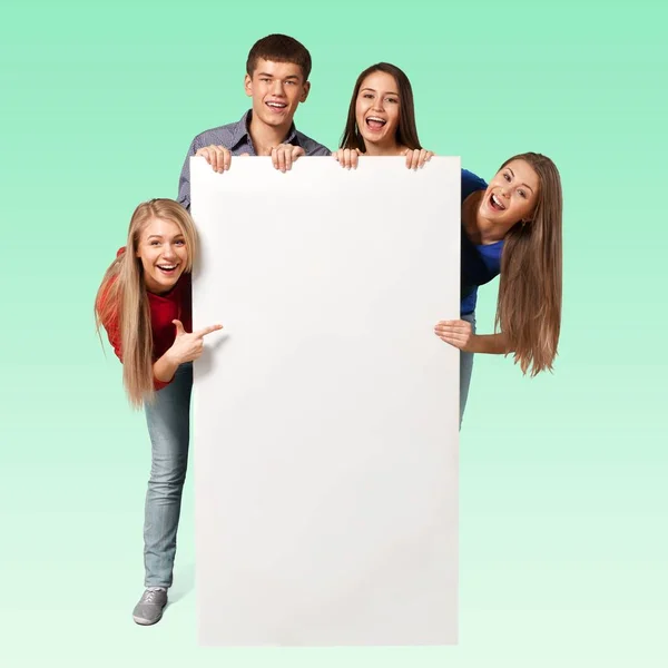 Glade Unge Menn Kvinner Som Holder Blanke Banner – stockfoto