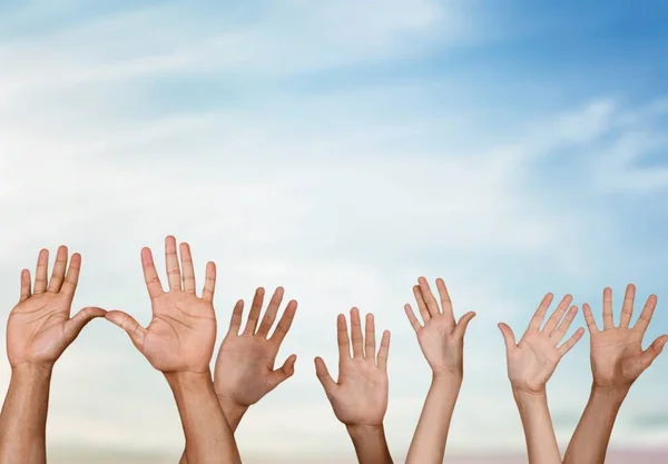 A lot of hands rising up — Stock Photo, Image