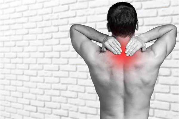 Man suffering from pain in neck — Stock Photo, Image