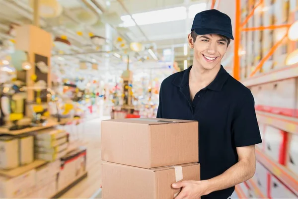 Shipping Concept Delivery Man Holding Boxes — Stock Photo, Image