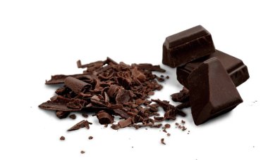 Pieces of delicious chocolate on  background  clipart