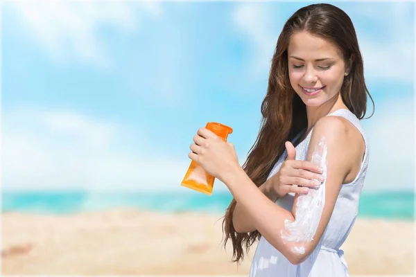 Woman with Sunscreen Solar Cream — Stock Photo © billiondigital #118536410