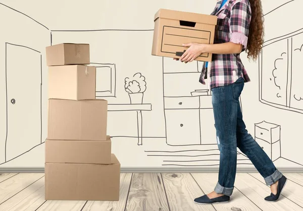 Woman moving into new house — Stock Photo, Image