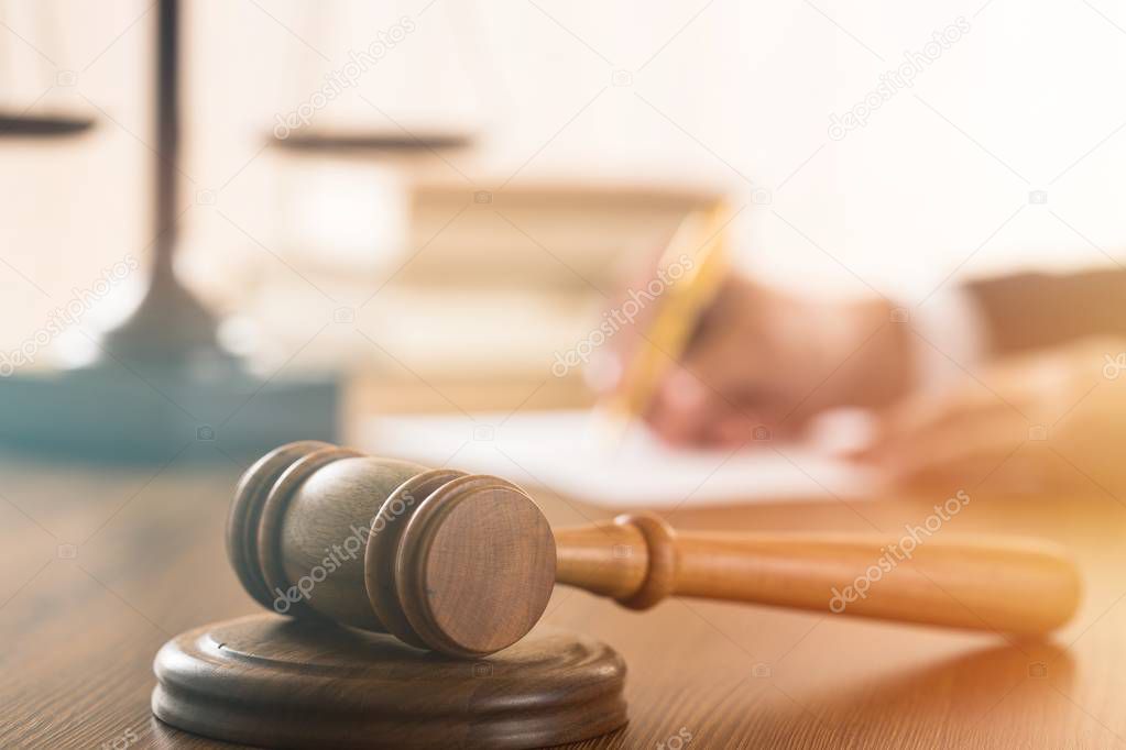 Close-up view of wooden judge gavel