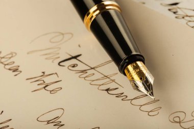Sheaffer Fountain Pen Lying on the Letter - Close Up clipart