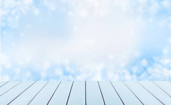 Empty wooden surface on blurred background