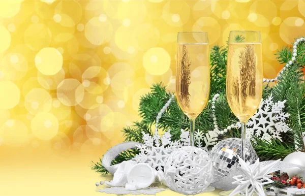 Flute glasses of champagne on festive background