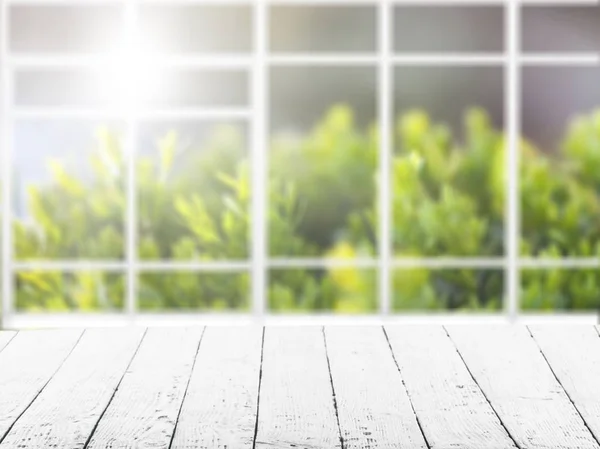 Empty wooden surface on blurred background