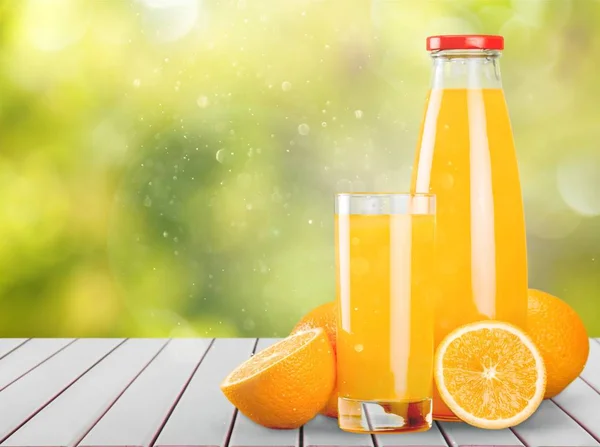Стекло Бутылка Апельсинового Сока Столе — стоковое фото
