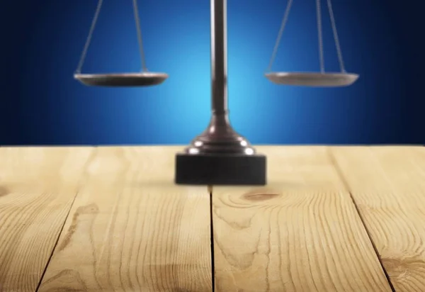 Law scales on table on  background