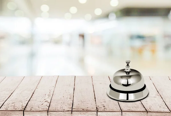 Reception service desk bell on blurred background