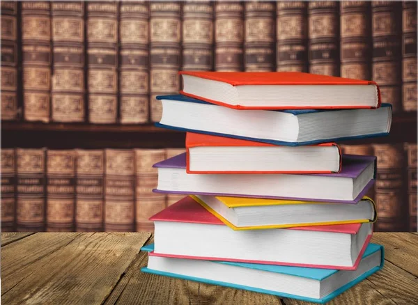 Big stack of books isolated on  background