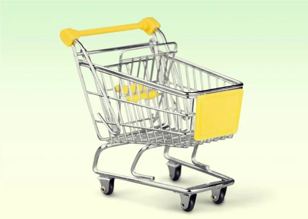 Shopping cart on white — Stock Photo, Image