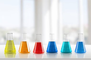 Cam laboratuvar şişe üzerinde arka plan bulanık