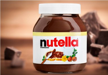 Nutella Fındıklı kavanoz ışık arka plan üzerine yayılmış 