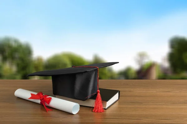 Graduation Hat Book Diploma Wooden Table — Stock Photo, Image