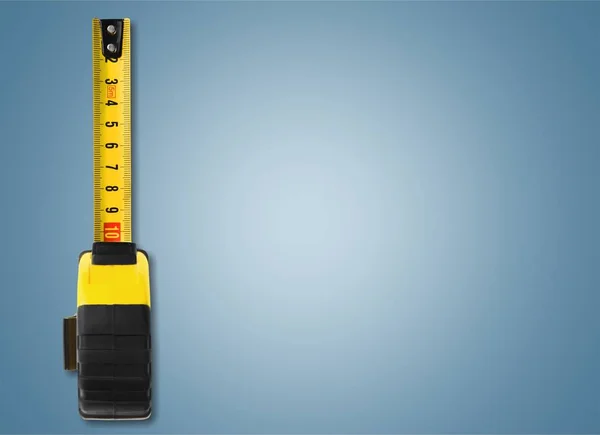 Желтая Измерительная Лента Синем Фоне — стоковое фото