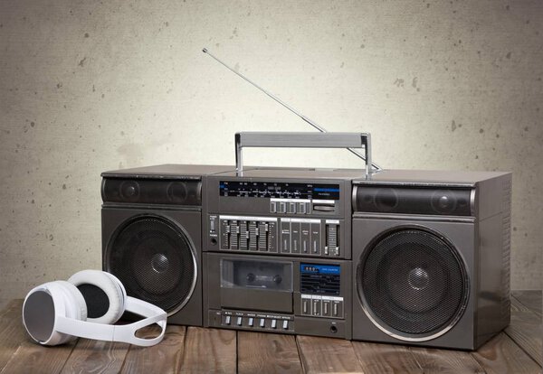 Old retro blaster cassette tape recorder on table