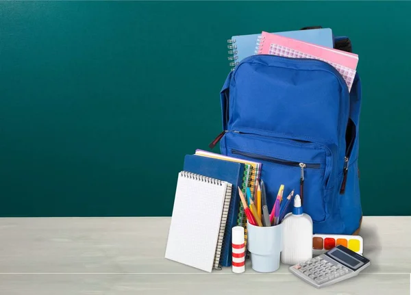 School Backpack with stationery, back to school background