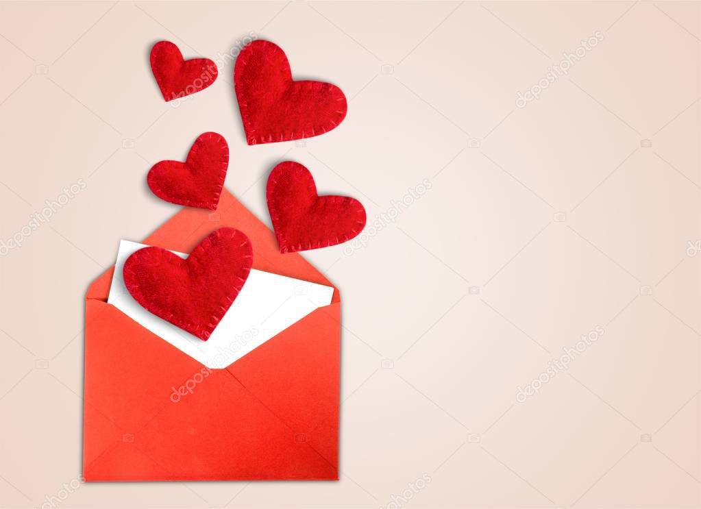 Valentine's day background with red hearts and envelope