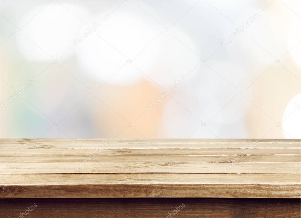 Empty wooden surface on blurred background