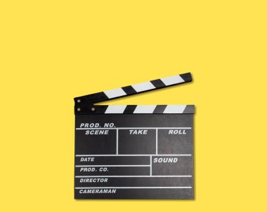 Movie clapper template on yellow background  clipart