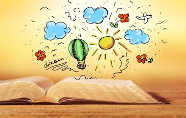 Arka planda izole bir tablo üzerinde açık kitap