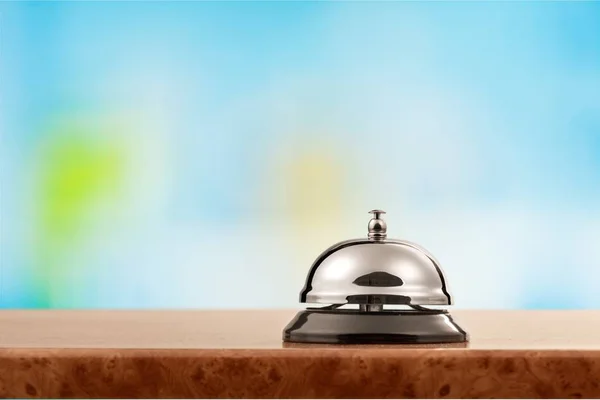 Reception service desk bell on blurred background