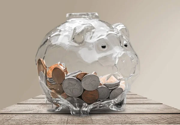 glass piggy bank full of coins