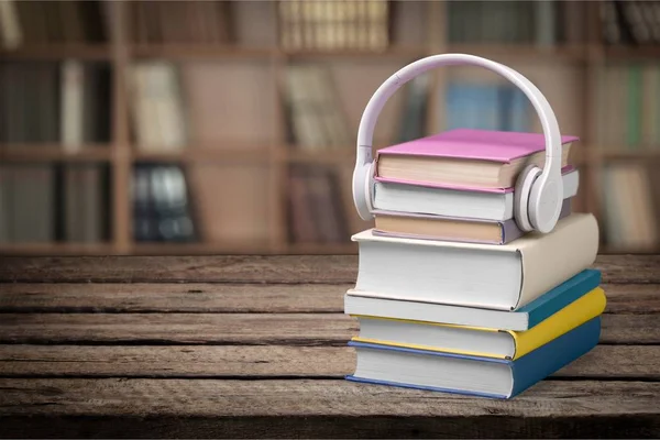 Stack Books Headphones Wooden Table — Stock Photo, Image