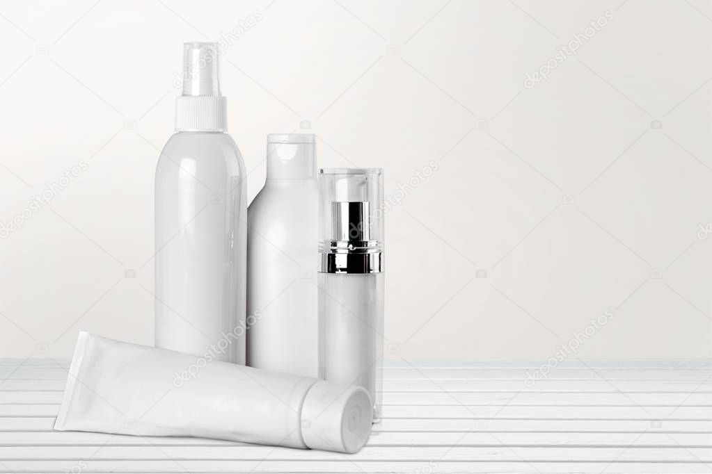 Set of cosmetic products on background