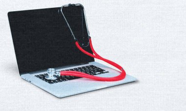 Modern dizüstü ve arka planda, yakından görmek stetoskop