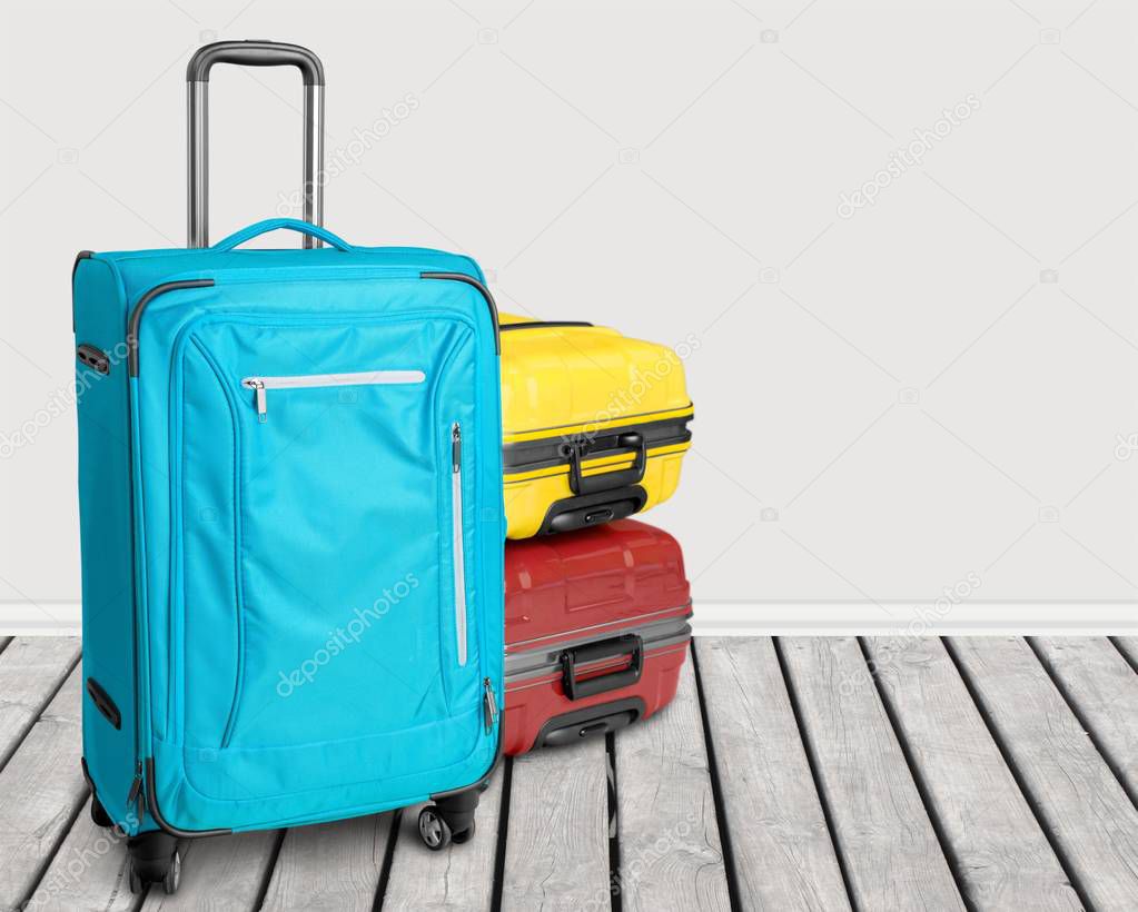 beautiful Colorful suitcases on background 