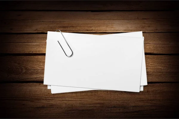 White Blank Papers Clip Wooden Planks Background — Stock Photo, Image