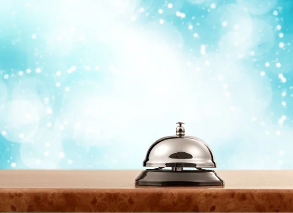 Reception service desk bell on blurred background