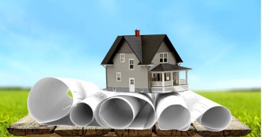 mimari planları ve gökyüzü arka plan üzerinde ev maket