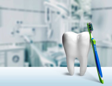 büyük diş modeli ve diş fırçası