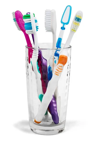 Colorful Toothbrushes Glass Isolated Background — Stock Photo, Image