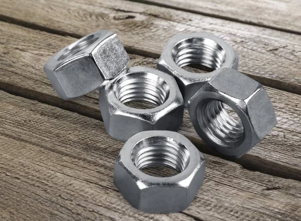 Pile Bolt Nuts Wooden Table — Stock Photo, Image