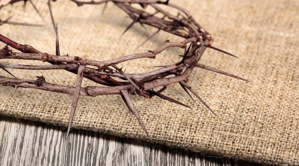 Crown of thorns on background, close-up view