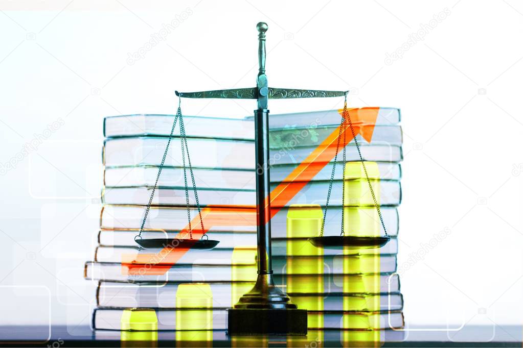 scales of justice on law books in library of law firm. concept of justice, legal, jurisprudence. legislation study.