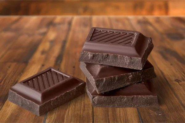 Kousky Lahodné Čokolády Pozadí — Stock fotografie