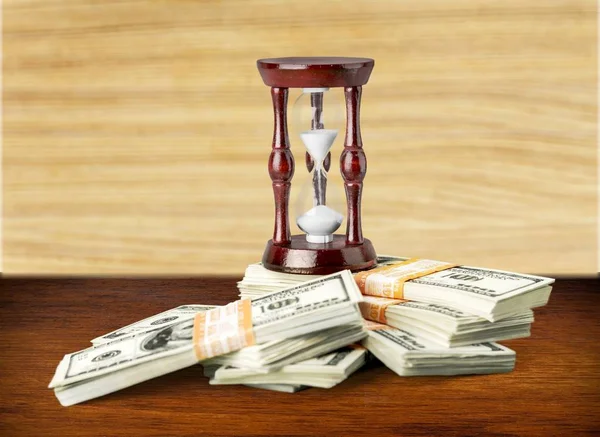 Hourglass Pack Dollars Table — Stock Photo, Image