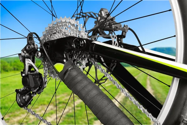 Bicycle gears and chain on bike on background