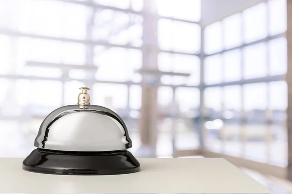 Reception service desk bell on blurred background