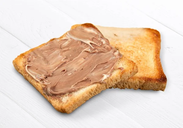 Toast Mit Erdnussbutter Auf Dem Hintergrund — Stockfoto