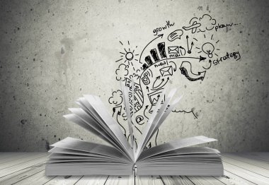 Ahşap masa, eğitim ve kavram öğrenme açık kitap