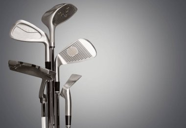 Arka plan üzerinde izole farklı golf kulüpleri 