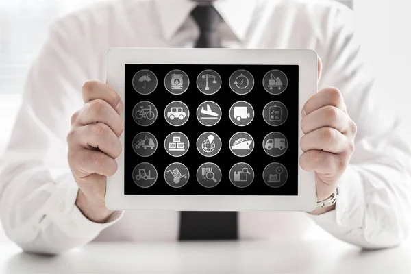 Empresário Segurando Tablet Com Ícones Diferentes — Fotografia de Stock